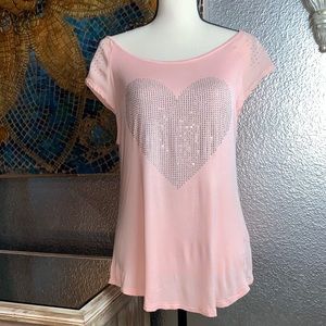 Pink top with bling heart design.